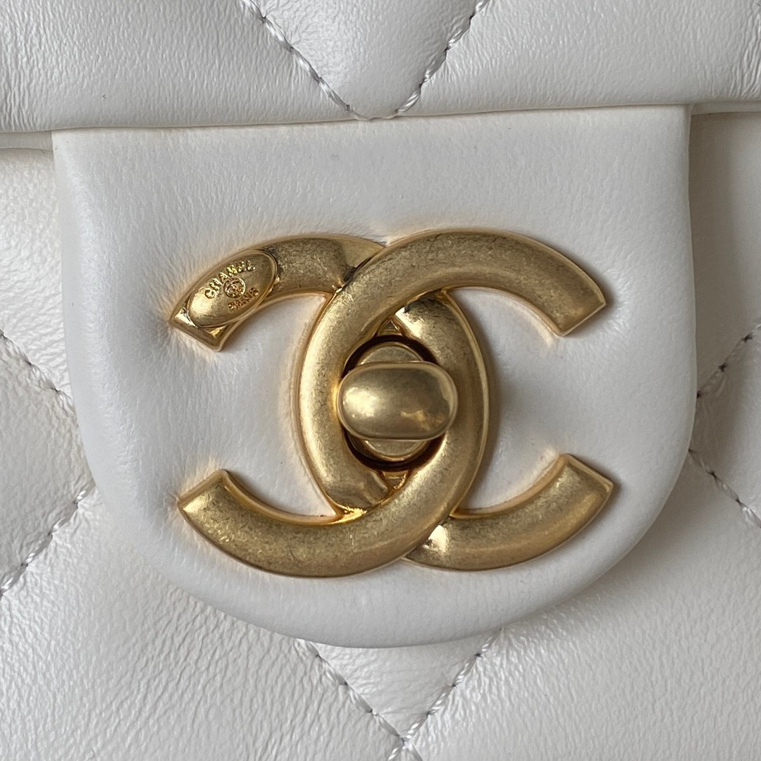 Ch*el small classic handbag grained shiny calfskin & gold-tone metal white 5.7 × 9 × 2.3 in